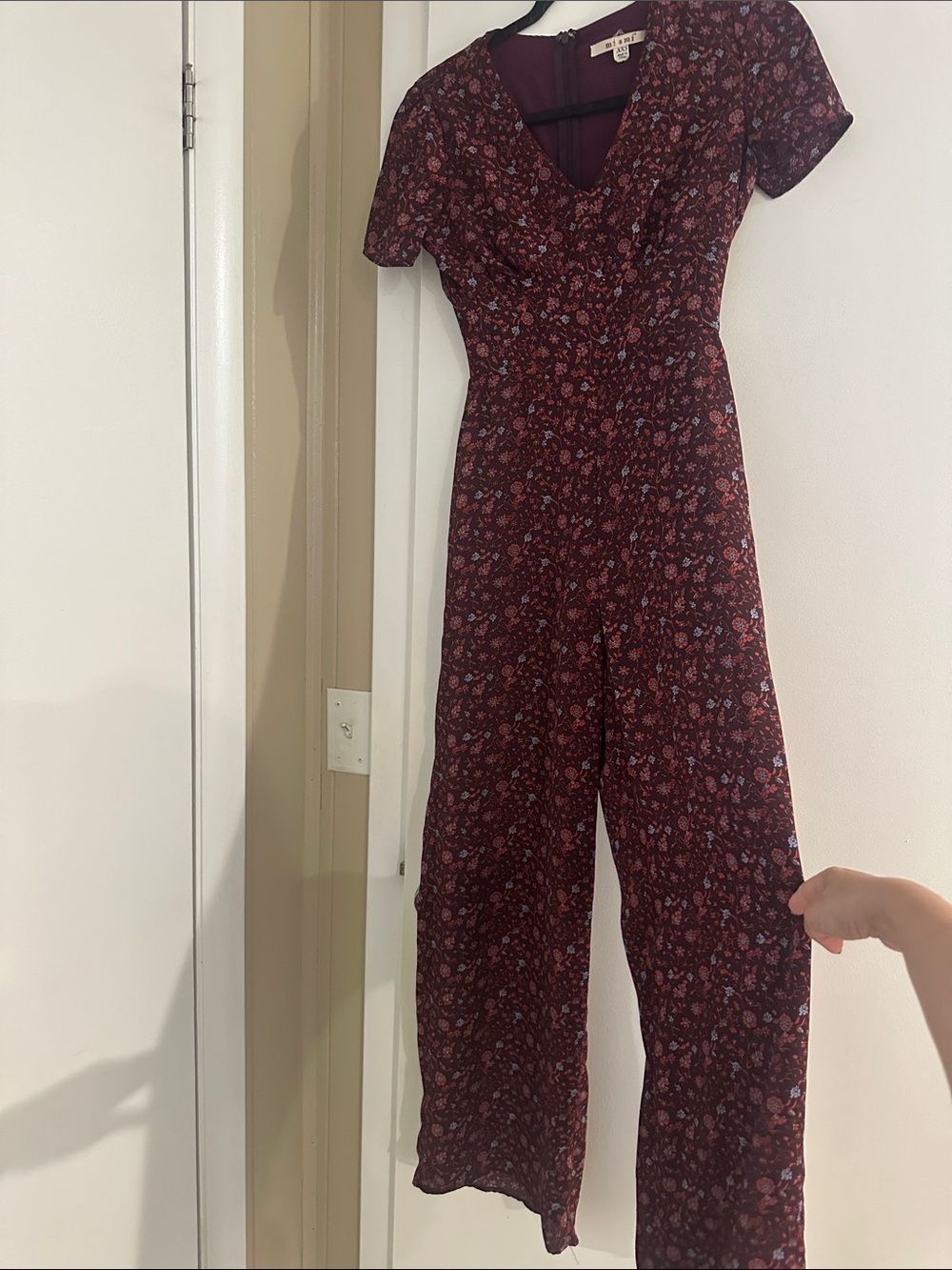 Francesca’s Floral V-Neck Short Sleeve Jumpsuit in Burgundy